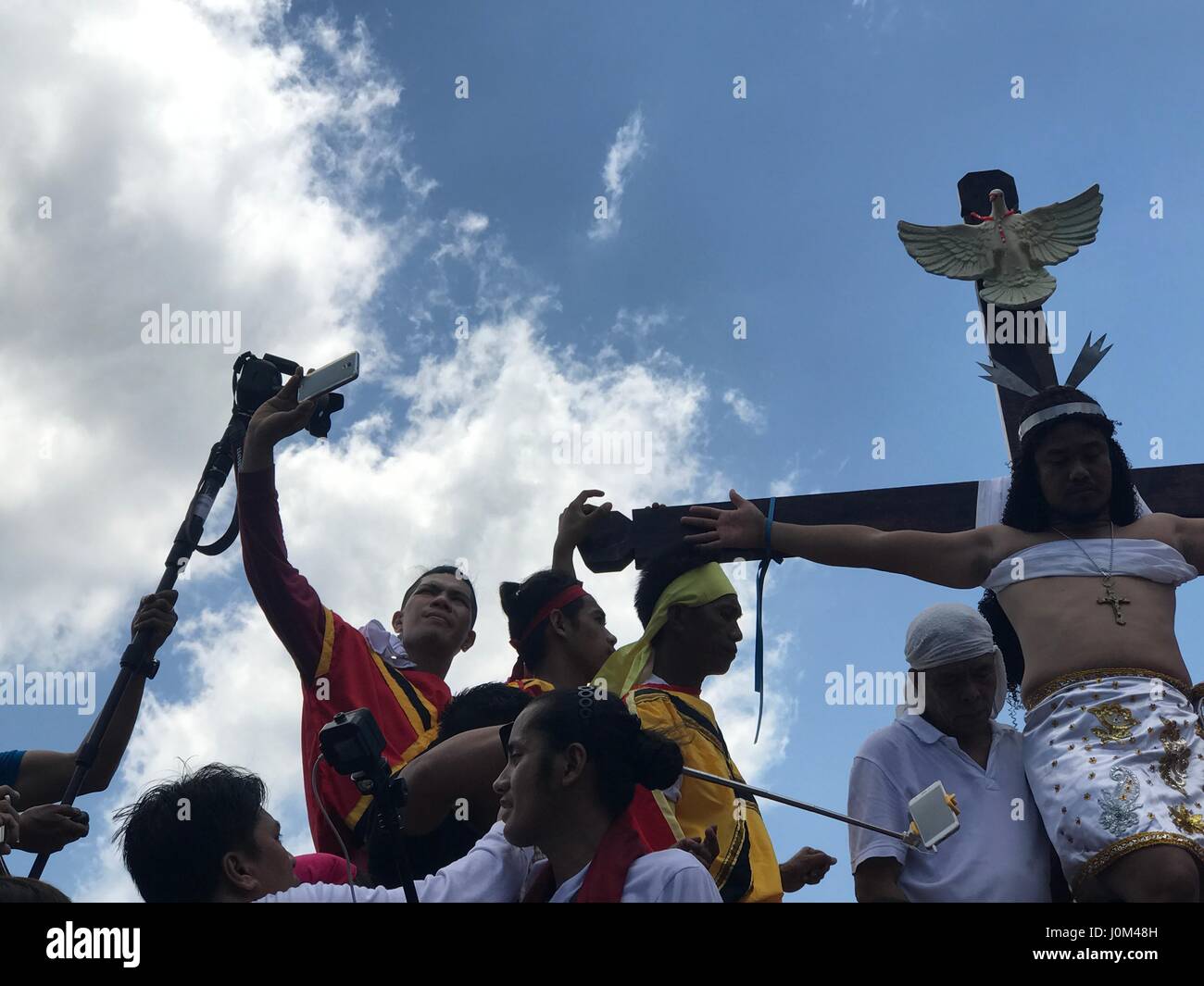 Woman crucified hi-res stock photography and images - Alamy