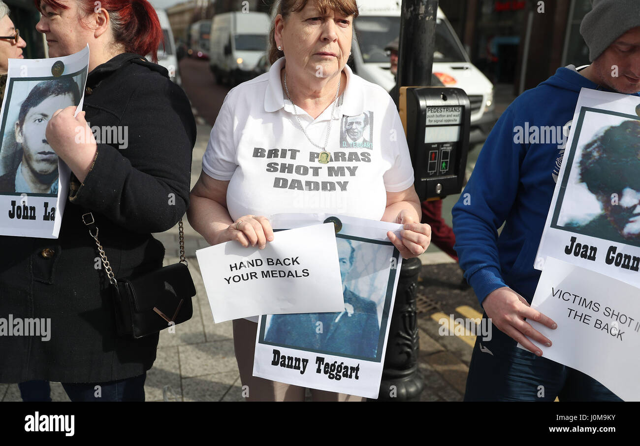 Protesters at a counter demonstration by dissident republicans against a military veterans' rally at City Hall, Belfast, which is seeking to highlight what it alleges is a legal witchhunt against former security members who served during the Troubles. Stock Photo