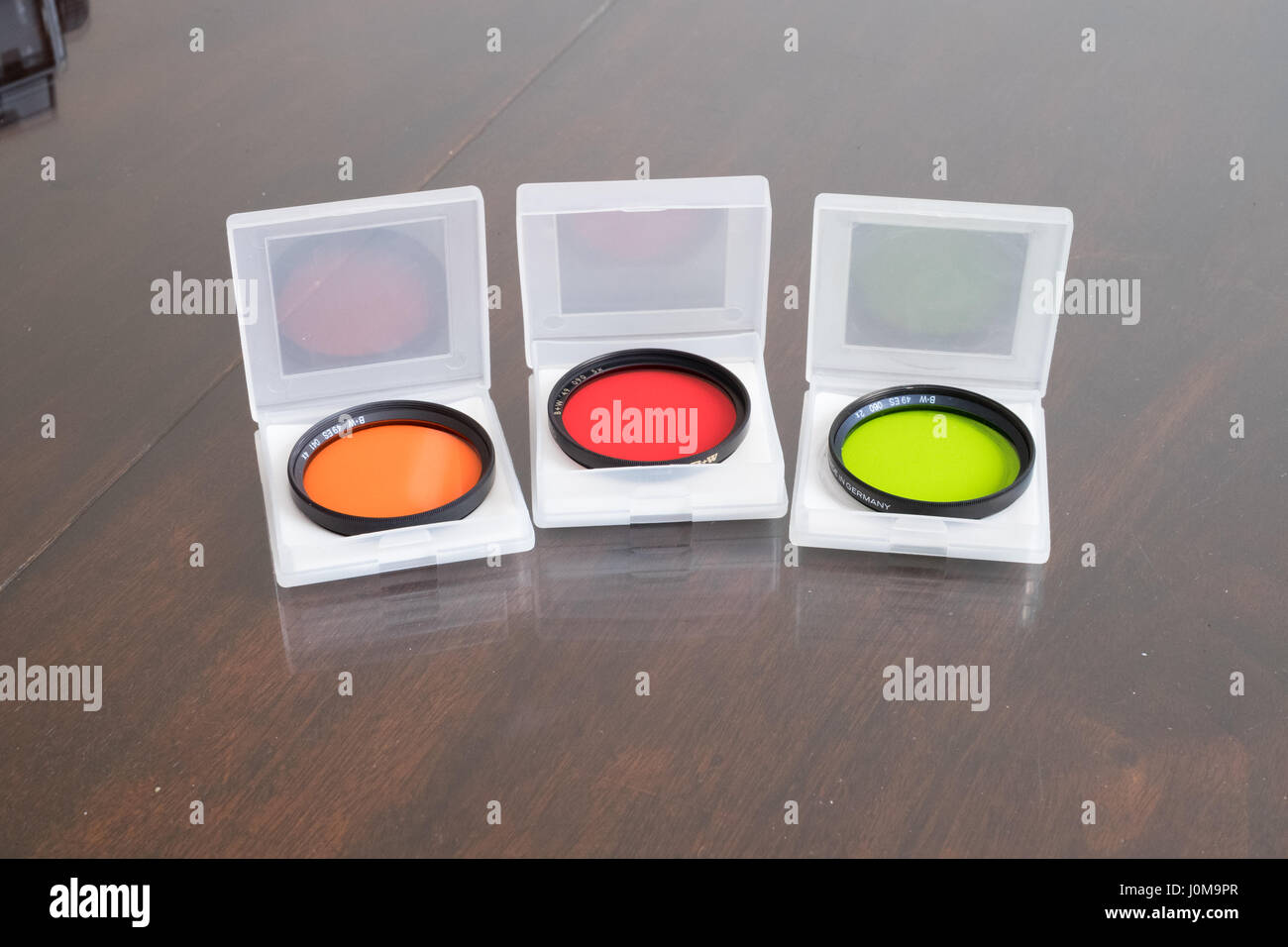 35mm filter set, orange, red and green in cases Stock Photo