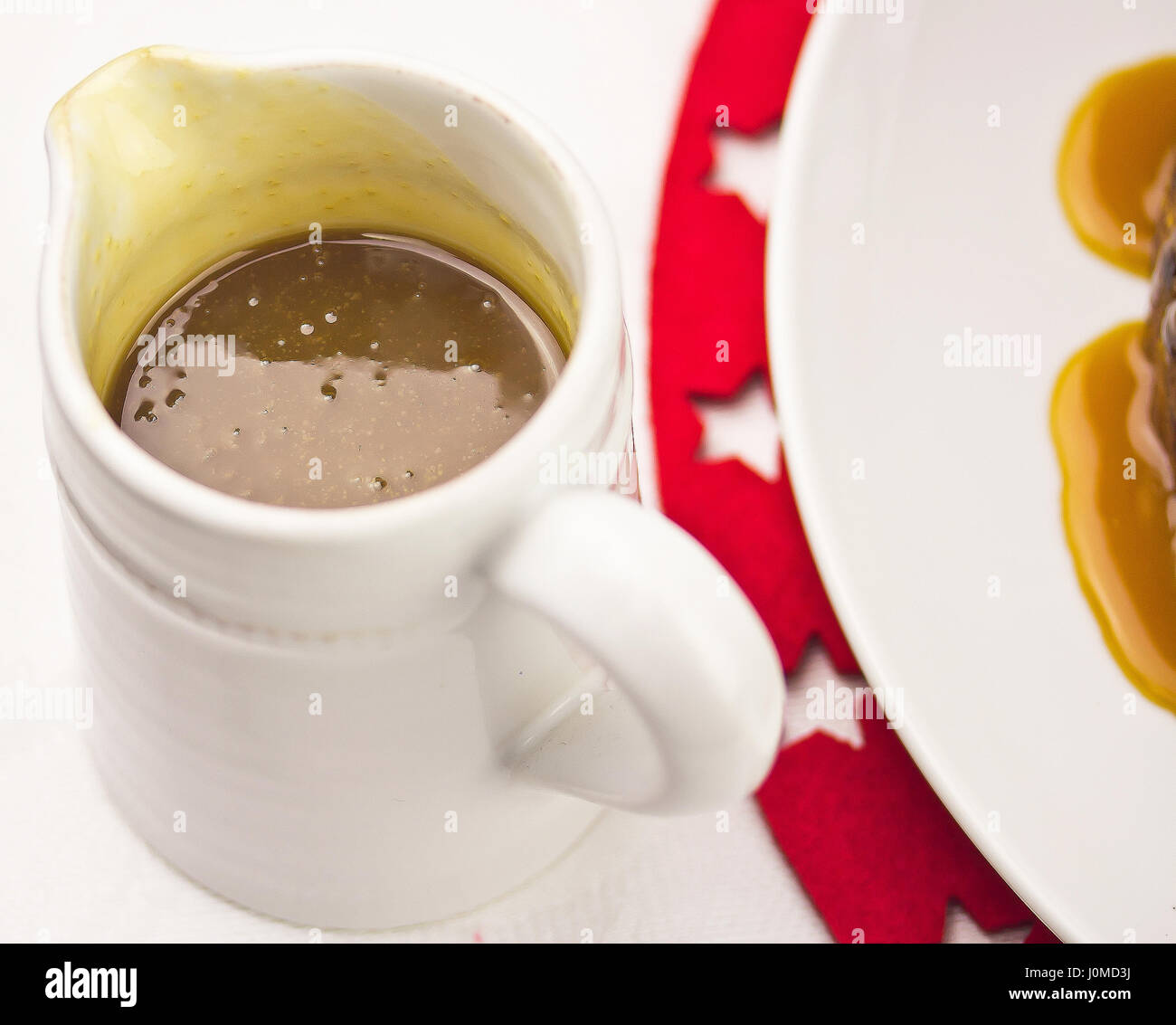 Caramel sauce in jug Stock Photo Alamy