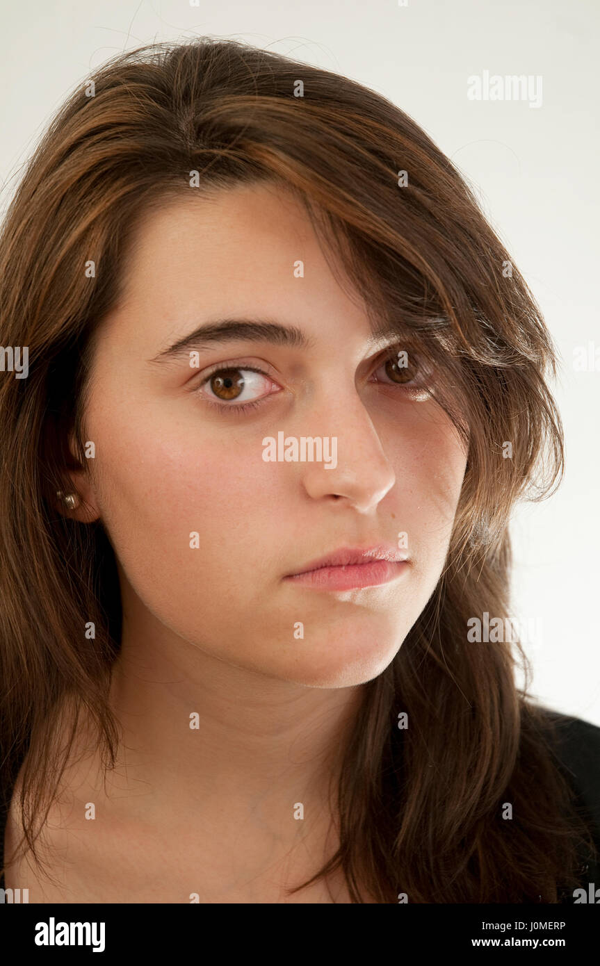 Young woman looking at the camera. Stock Photo