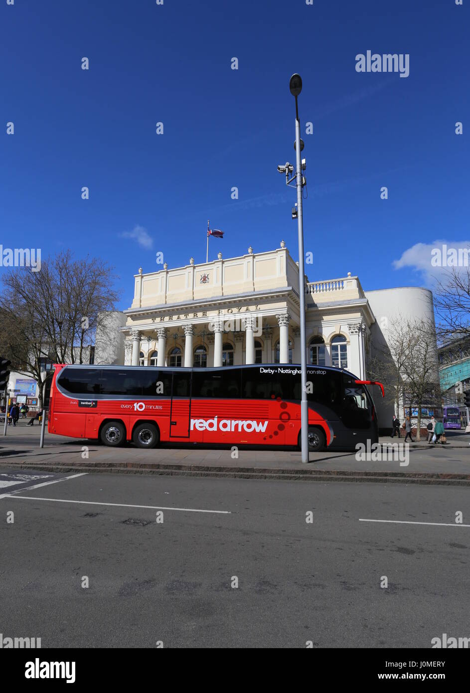 Red Arrow express bus passing Theatre Royal Nottingham UK  April 2017 Stock Photo