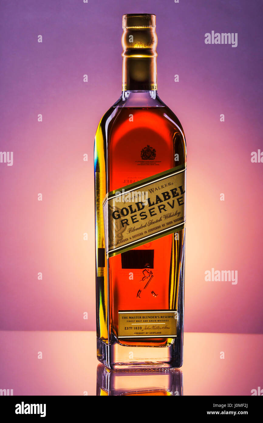 Johnnie Walker Gold Label blended whisky on gradient background