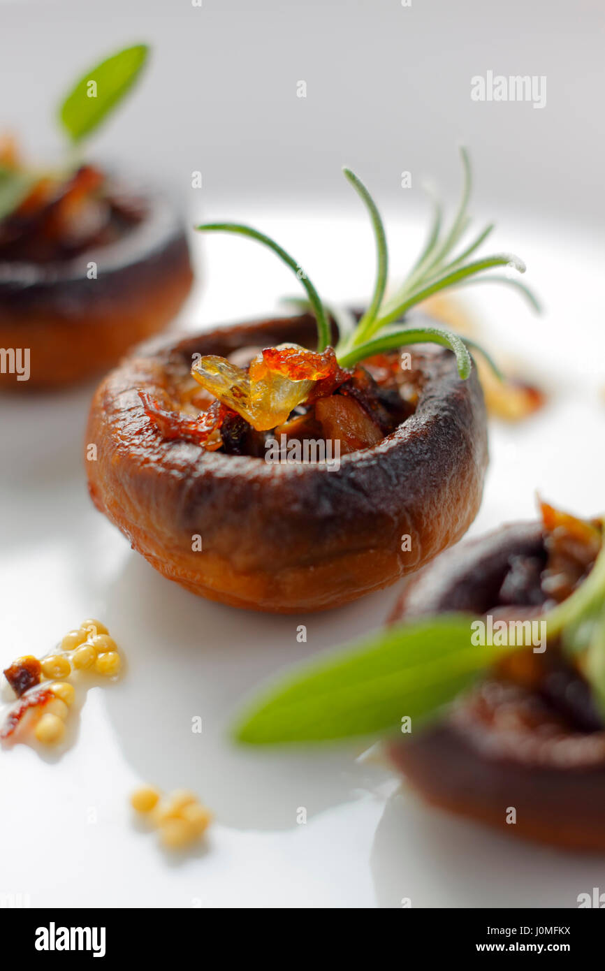 Closeup of fried button mushrooms in a row on plate Stock Photo Alamy