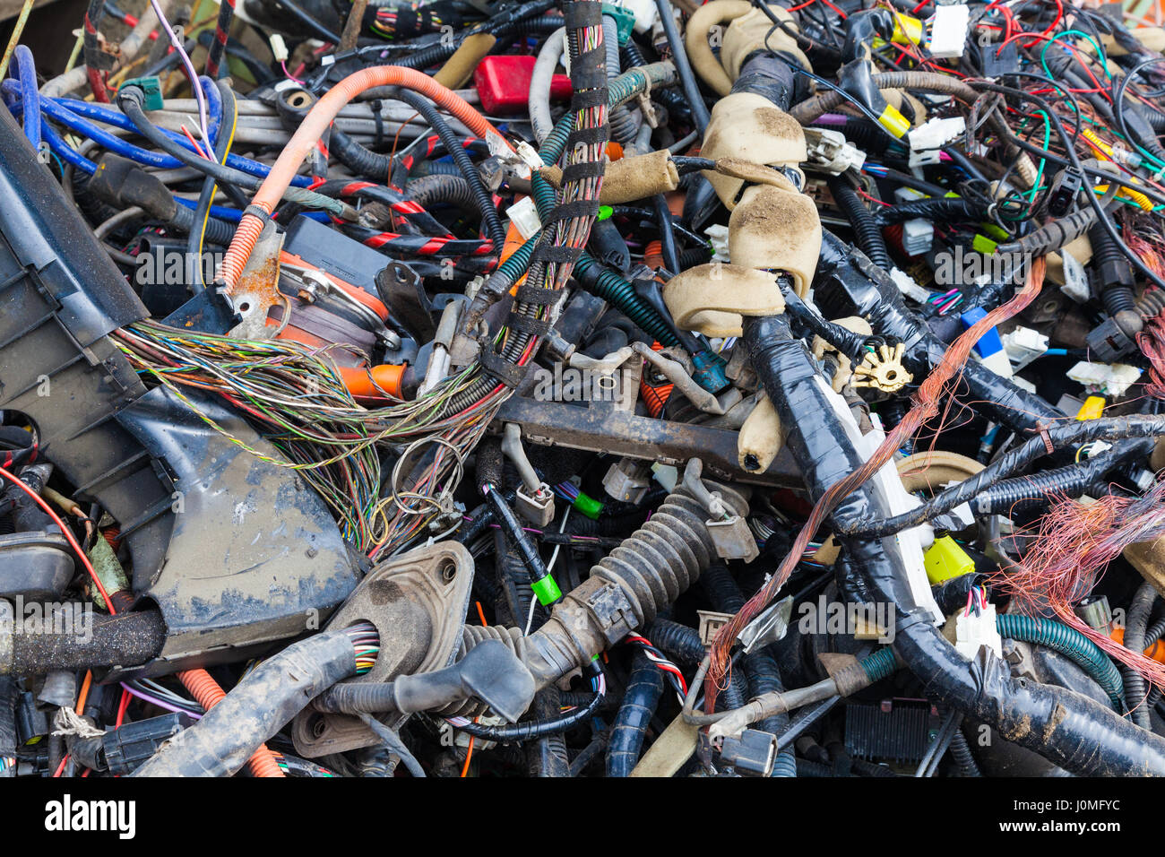 Scrap electrical wiring bundles salvaged from vehicles Stock Photo