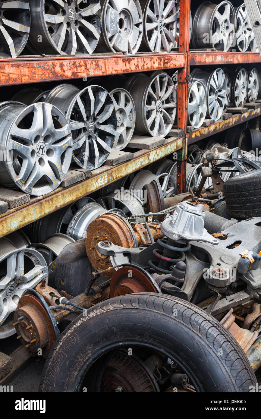 Junk pile and sorted alloy wheel rims for Japanese cars Stock Photo Alamy