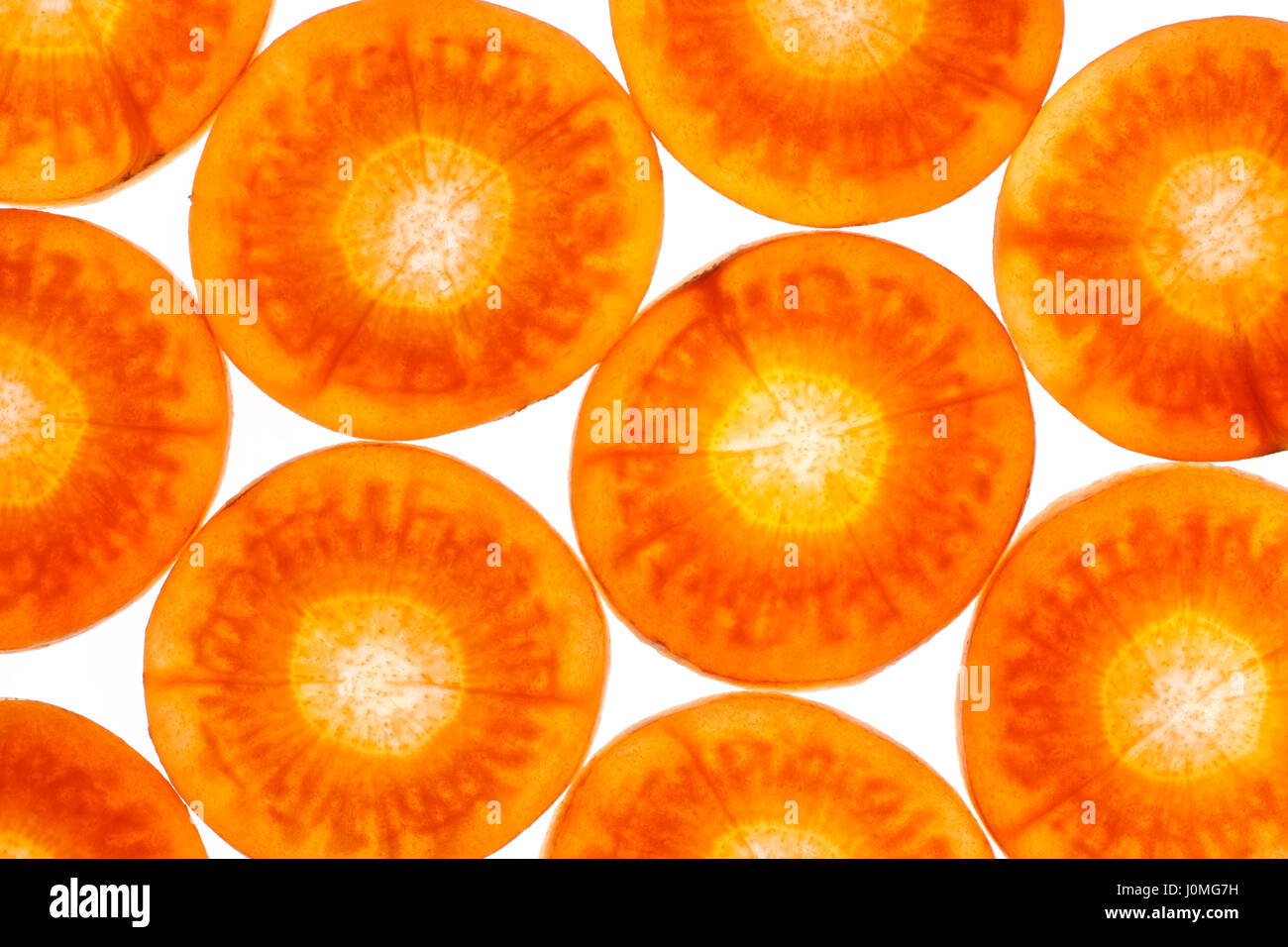 Carrot slices from above. Close up, full frame shoot. Stock Photo