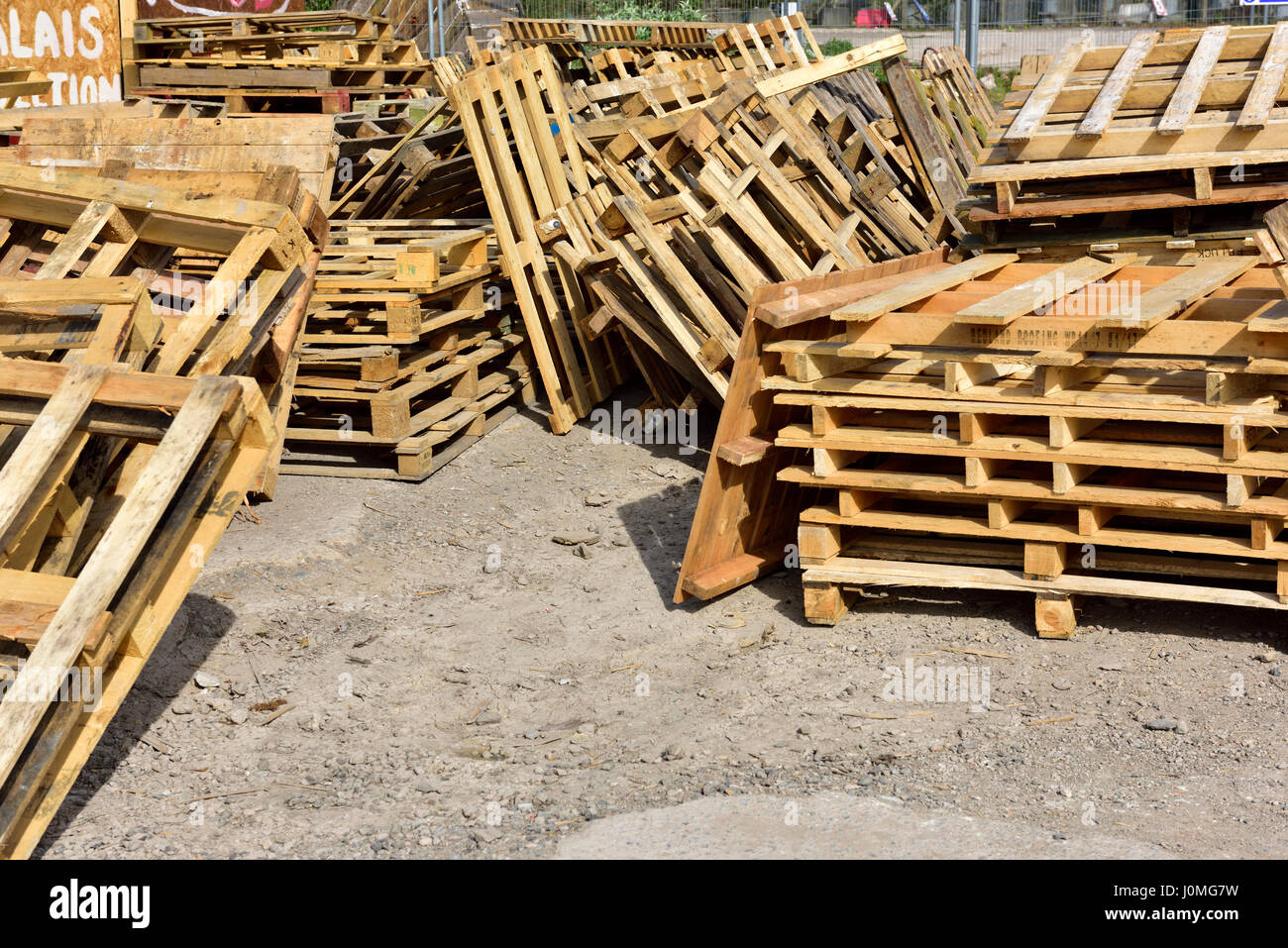 Wooden pallets and scrap wood for recycling Stock Photo