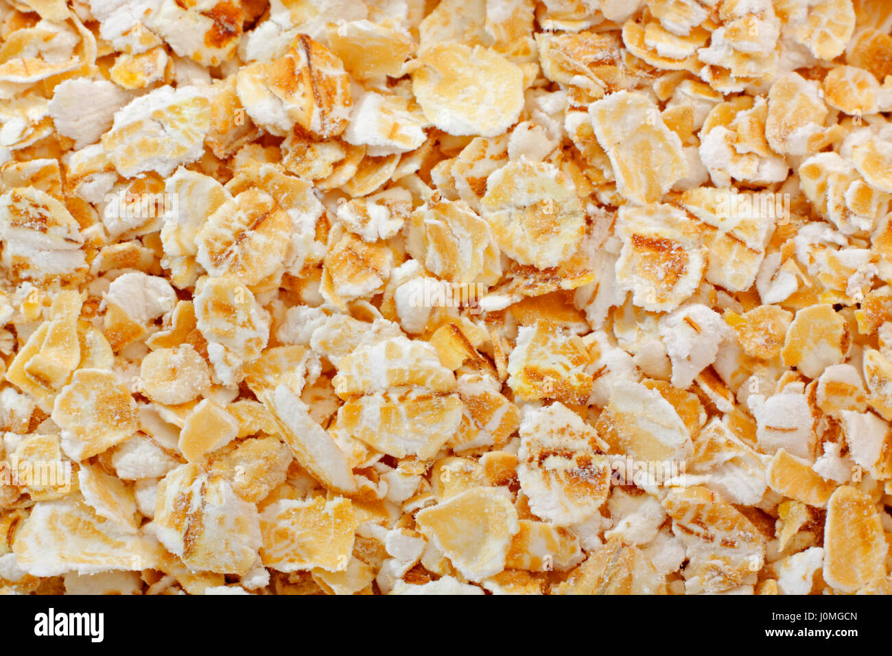 Rolled oats close up. Full frame shoot. Stock Photo