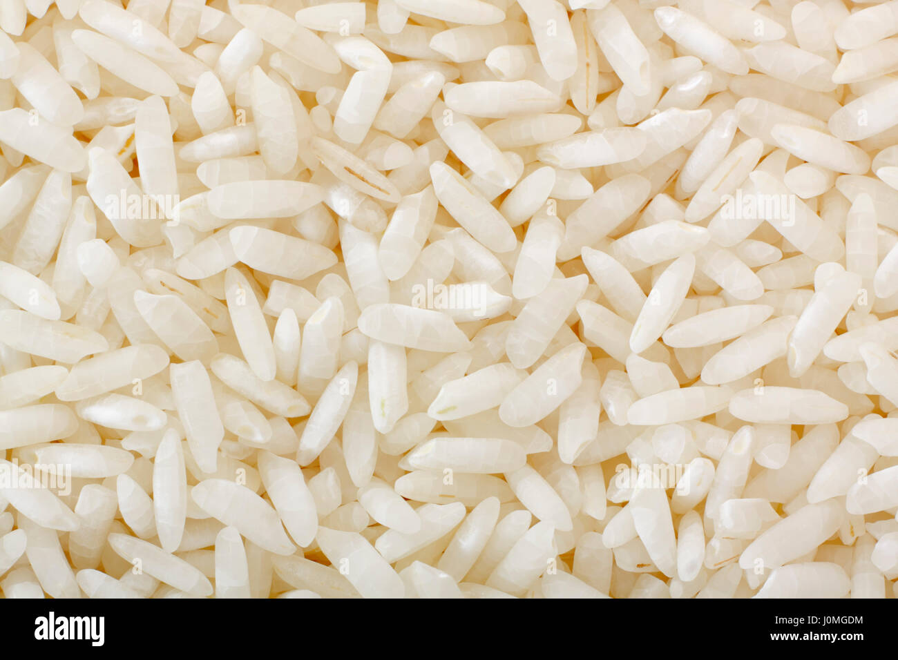 White rice grains close up. Full frame shoot. Stock Photo