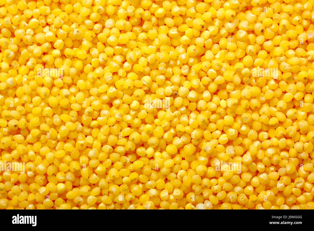 Millet groats closeup. Full frame, top view Stock Photo Alamy