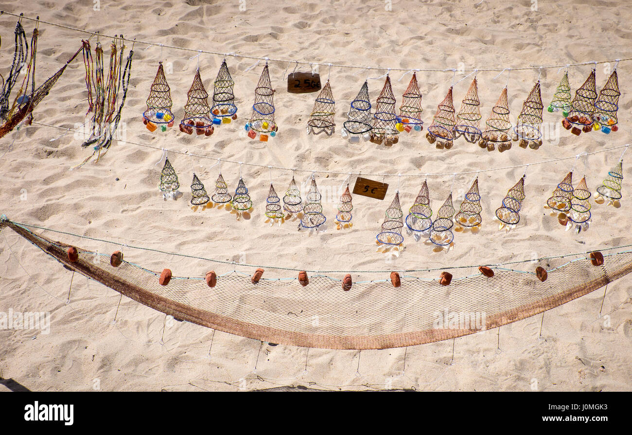 sandy beach in nazare with gifts for sale on display Stock Photo Alamy