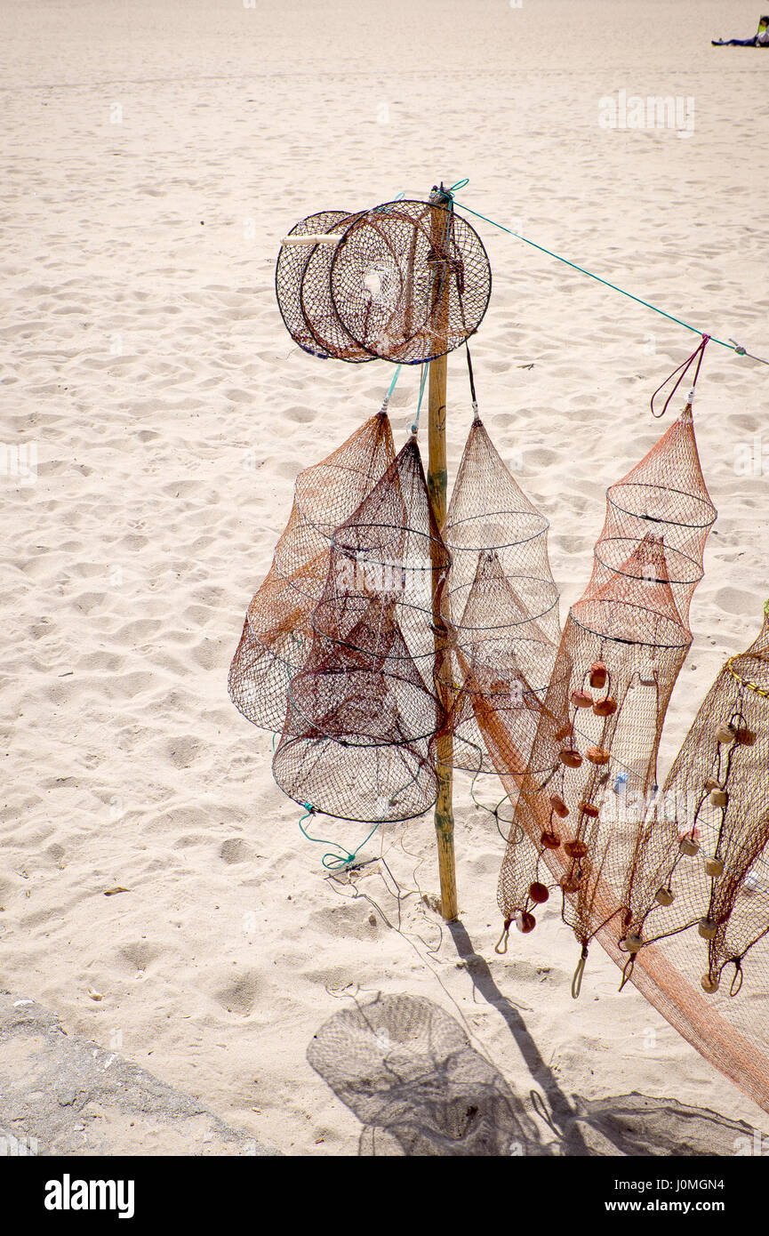 sandy beach in nazare with gifts for sale on display Stock Photo Alamy