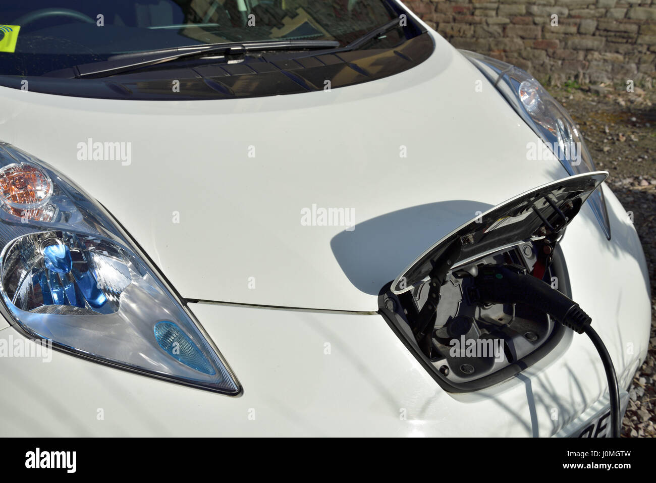 Nissan Leaf electric car being charged Stock Photo