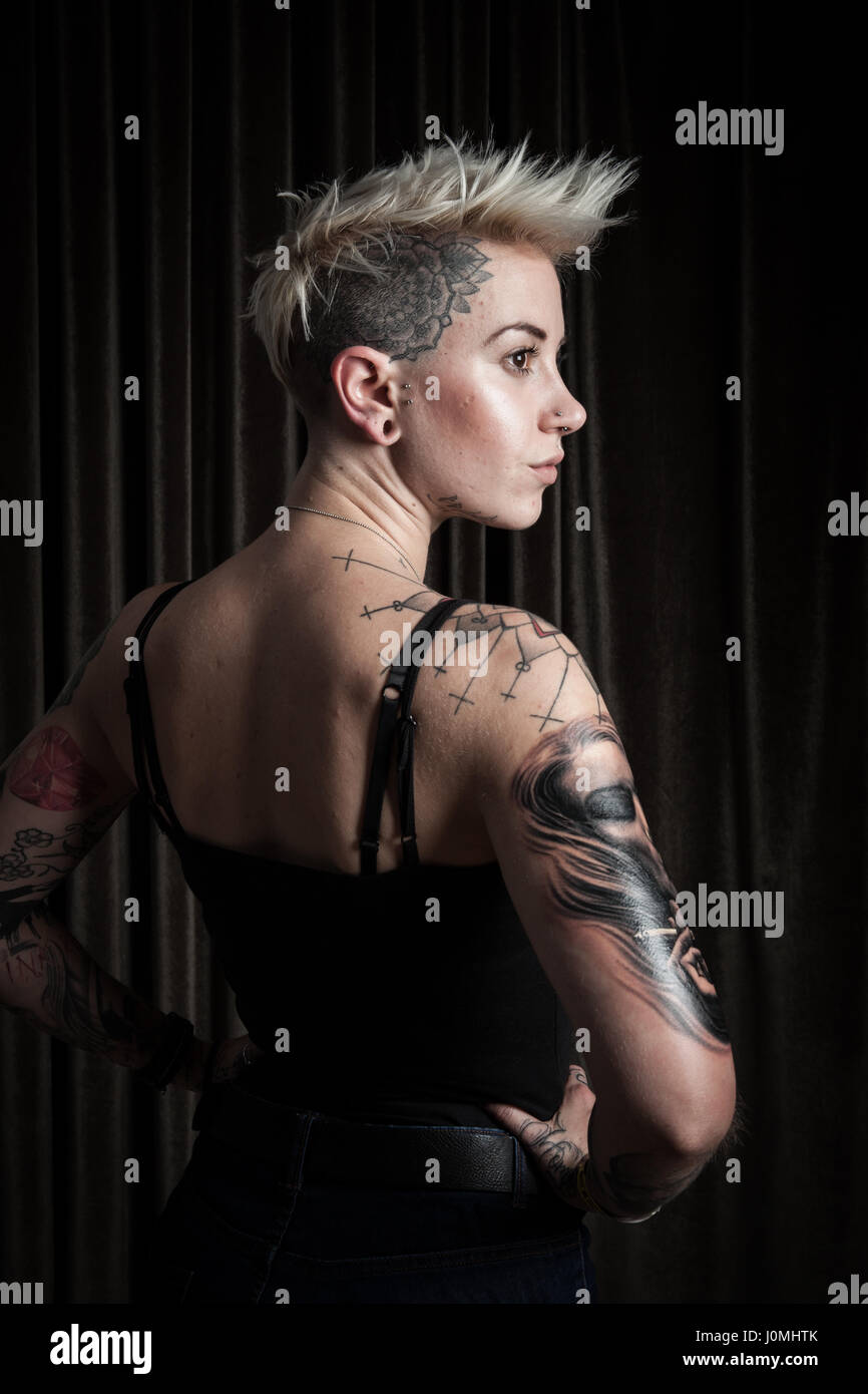 GALWAY, IRELAND - SEPTEMBER 12: Portrait of unidentified  woman with tattoo who was taking part at The 3rd Annual International Galway Tattoo Show Stock Photo