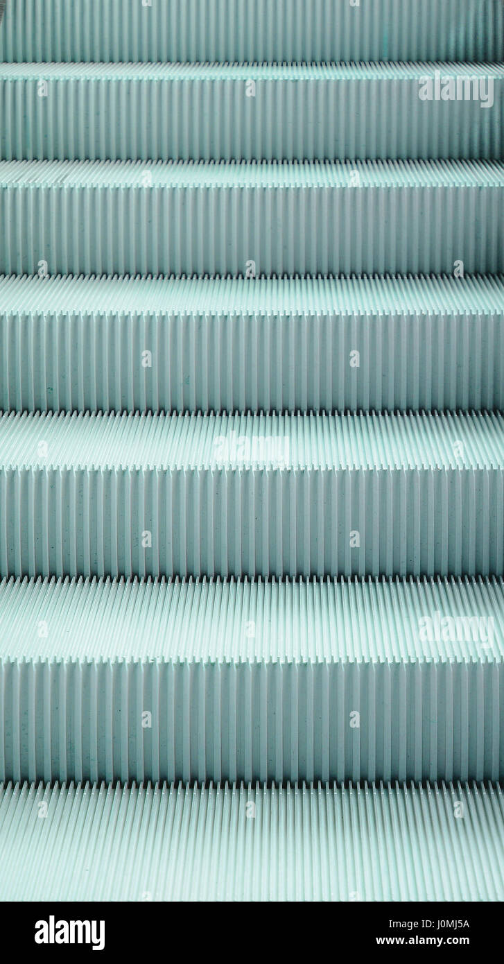 Light blue escalator pattern, close-up step, texture Stock Photo