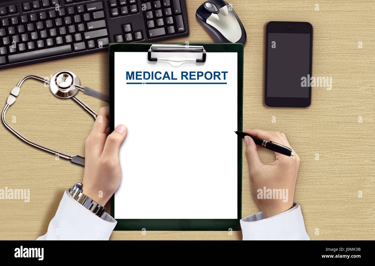 Doctor reading medical chart from top view angle Stock Photo Alamy