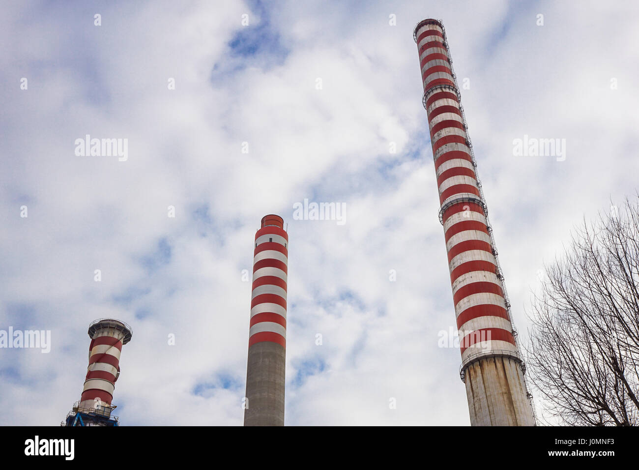 Industrial chimney urban scenery near at power plant Stock Photo - Alamy