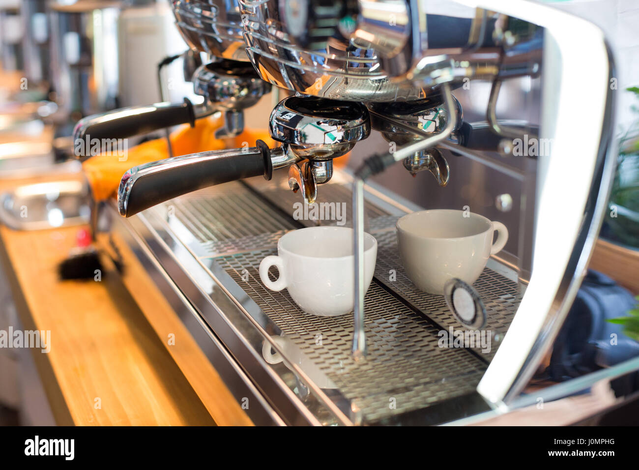 coffee machine makes cup hot espresso Stock Photo Alamy