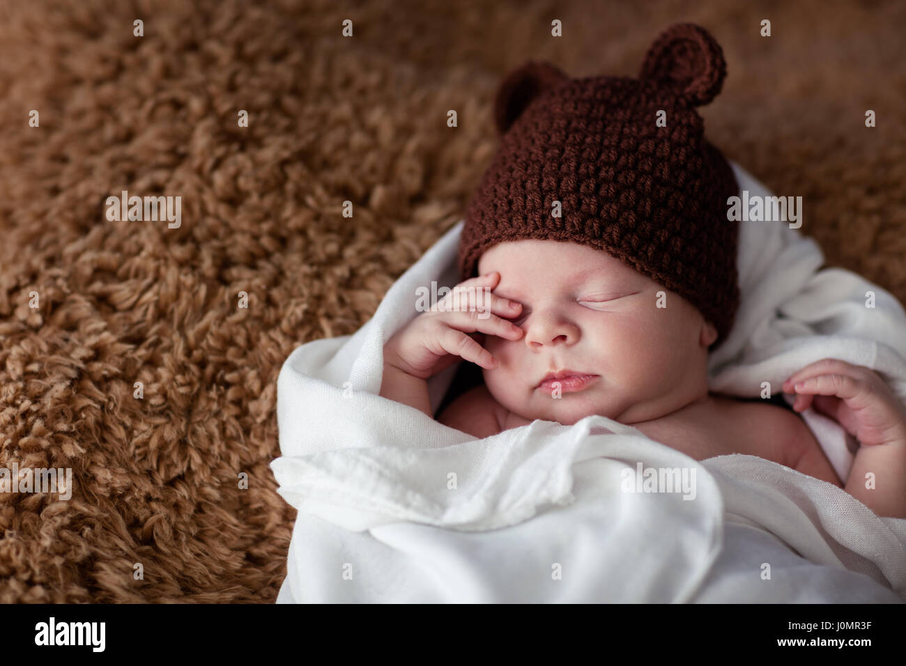 little newborn baby boy sleeping in funny hat with ears Stock Photo Alamy