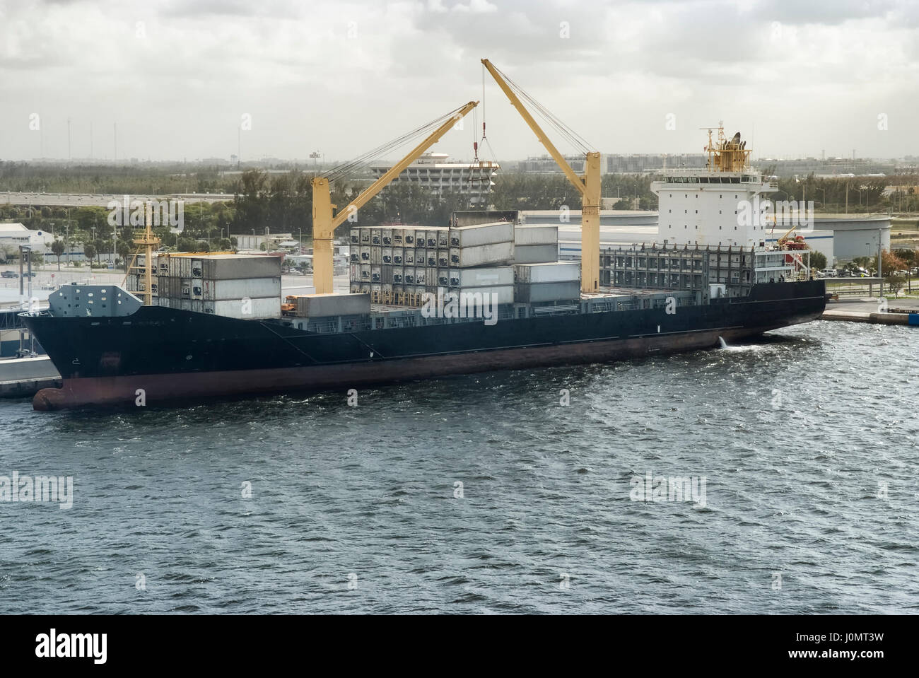 Cargo ship loading containers at the port of Fort Lauderdale, FL, USA