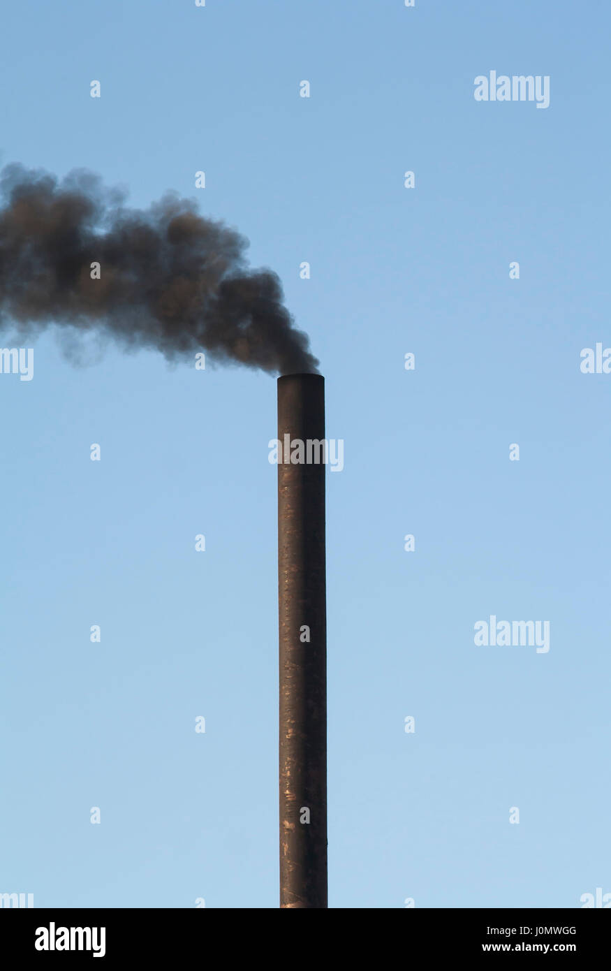 Black smoke from the boiler room pipe Stock Photo Alamy