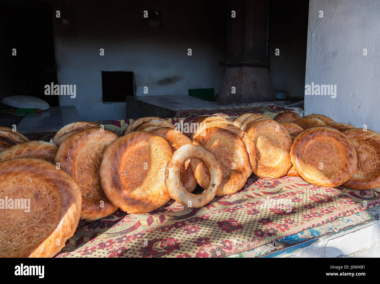 Traditional uzbek flatbread with sesame seeds from the tandir Stock Photo Alamy