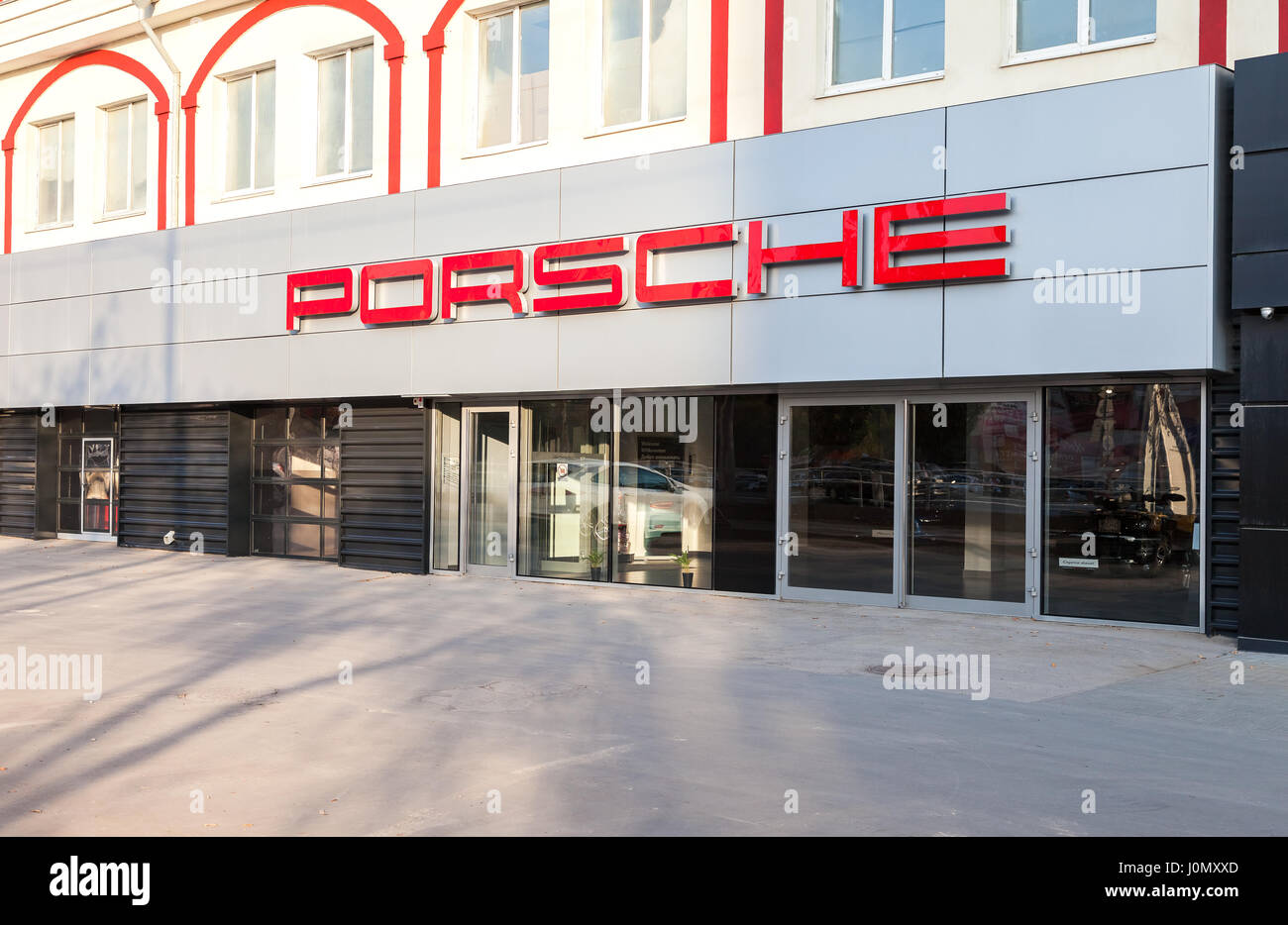 Samara, Russia - september 26, 2015: Office of official dealer Porsche. Porsche is a German holding company with investments in the automotive industr Stock Photo