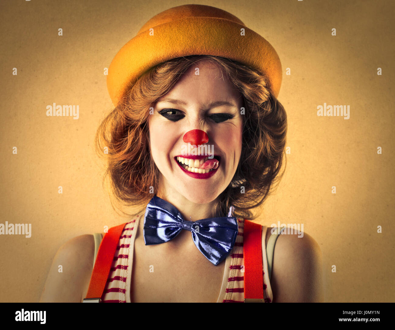 young woman with body painting on her face, ugly scary clown, Halloween  topic Stock Photo - Alamy