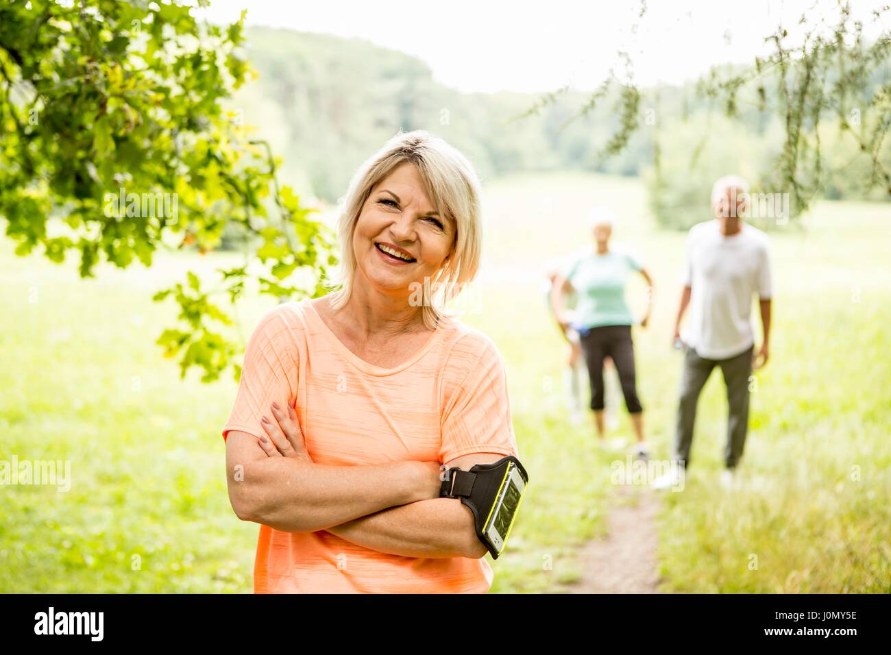 Mature woman resting after exercise. Stock Photo