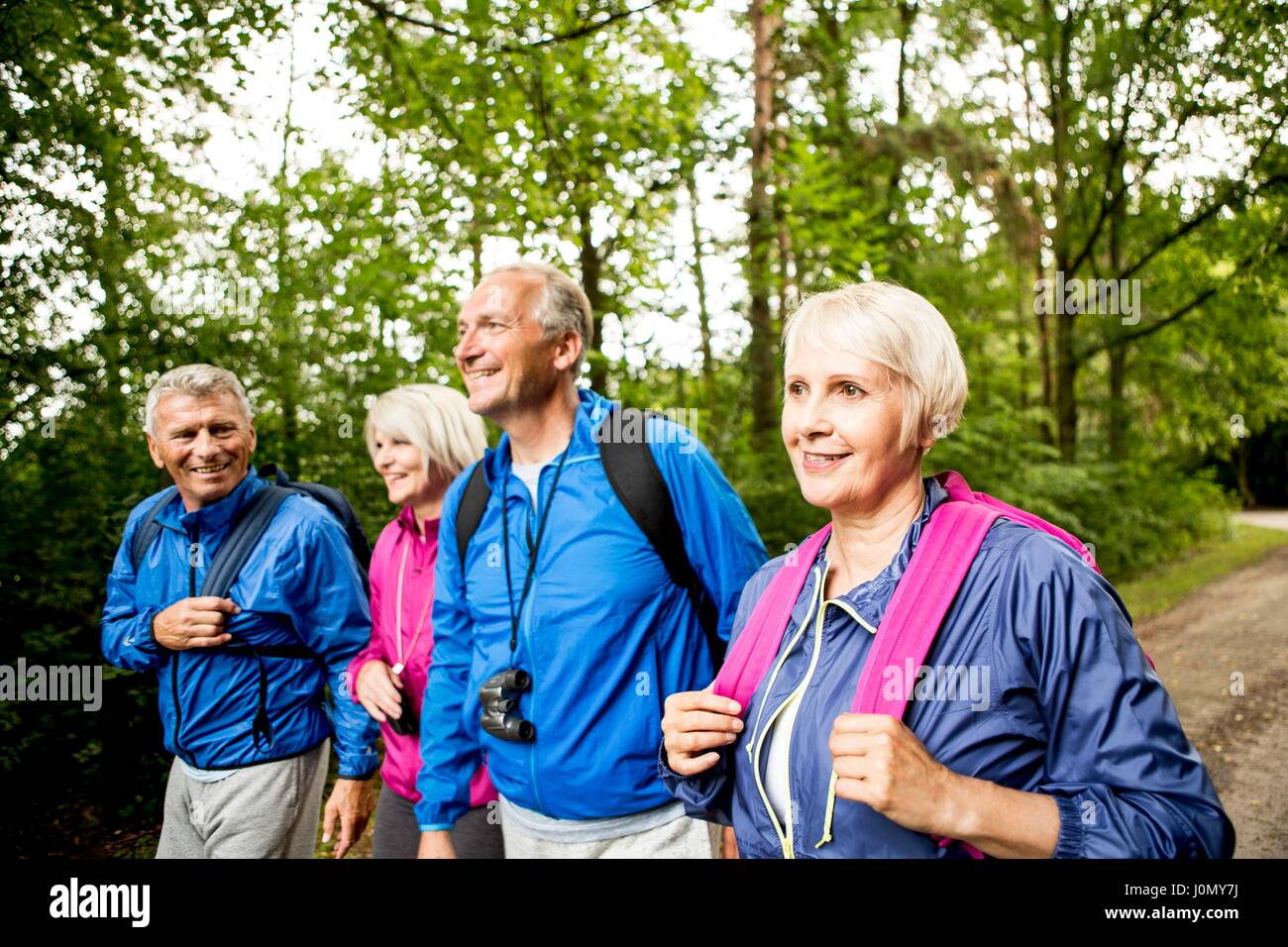 Four people on hike. Stock Photo