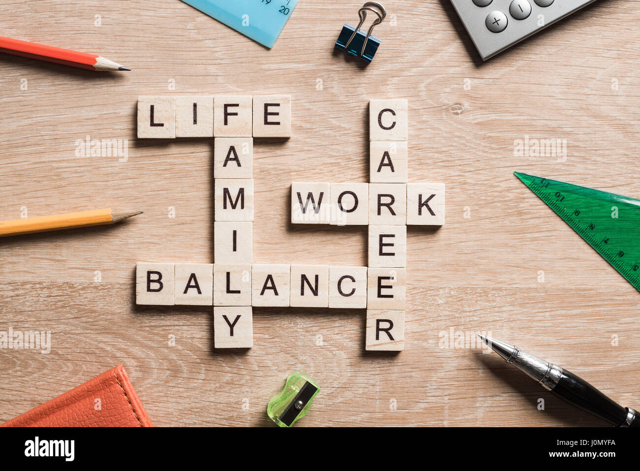 Words work life balance and family on table collected with wooden cubes ...