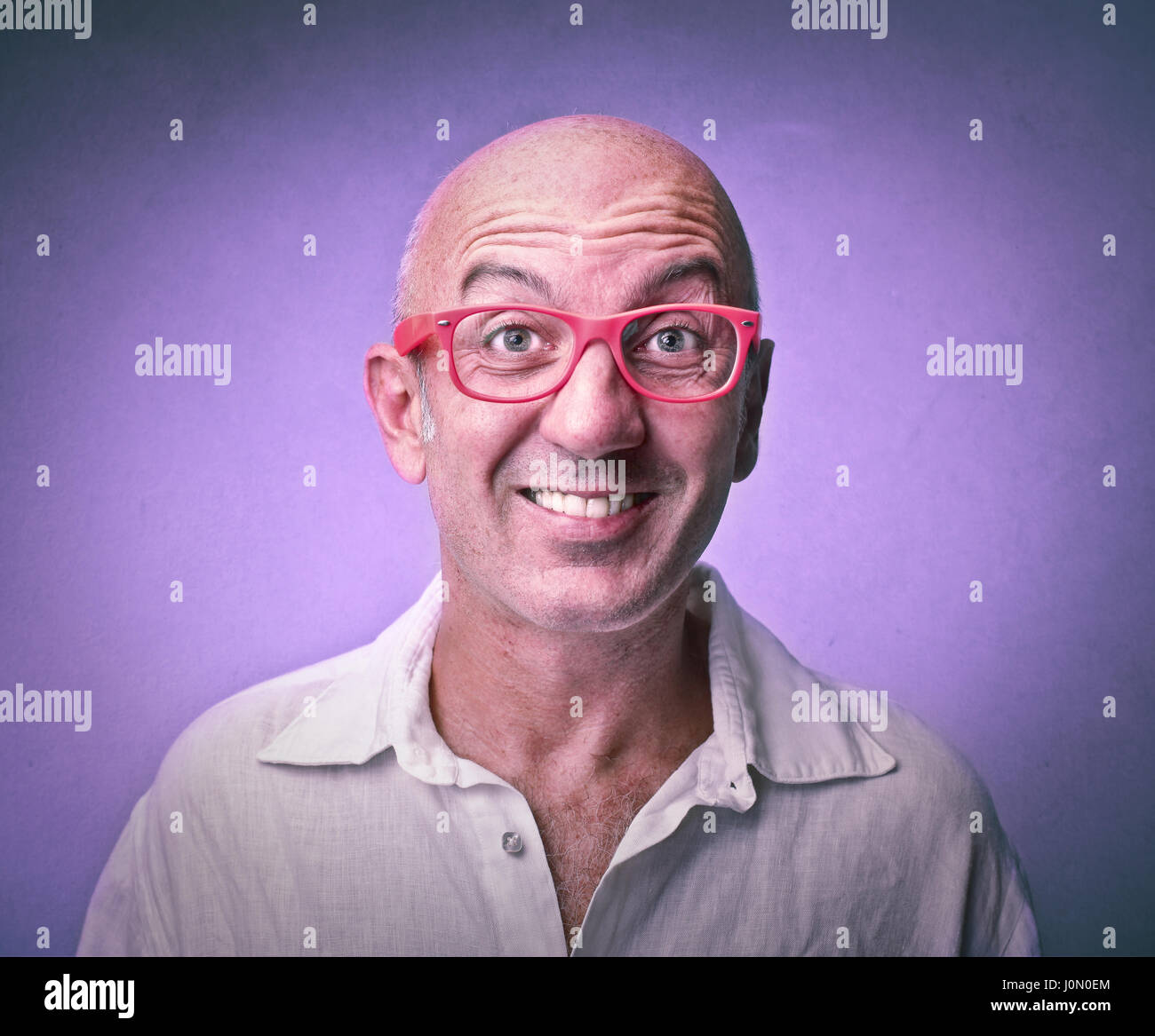 Bald man smiling Stock Photo