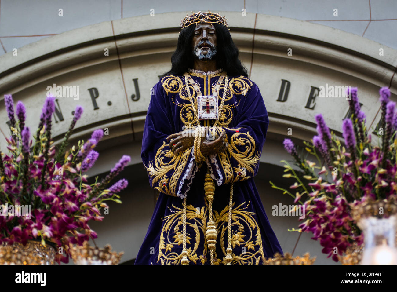 Madrid, Spain. 14th Apr, 2017. The figure of Jesus de Medinaceli comes out of the church for the procession of Good Friday Credit: Marcos del Mazo/Alamy Live News Stock Photo