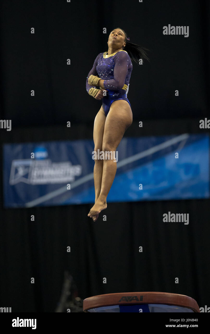 St. 14th Apr, 2017. LSU's Kennedi Edney flies through the air on the vault during the Semifinals