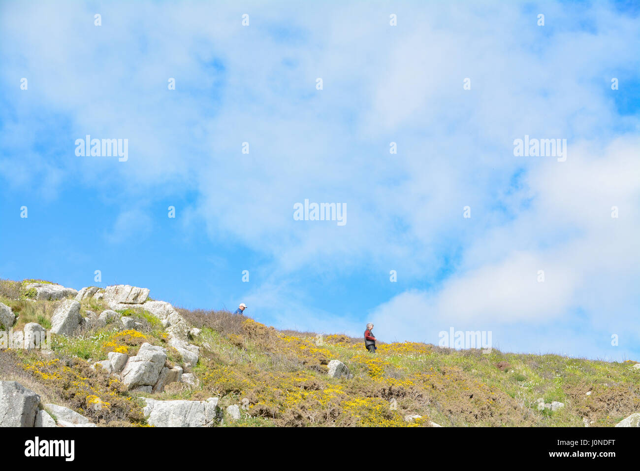 Treen, Cornwall, UK. 15th April 2017. UK Weather. A warm and sunny afternoon on the beach at Treen, and the south west coast path. With people enjoying the unspoilt beach and clear seas. Credit: cwallpix/Alamy Live News Stock Photo