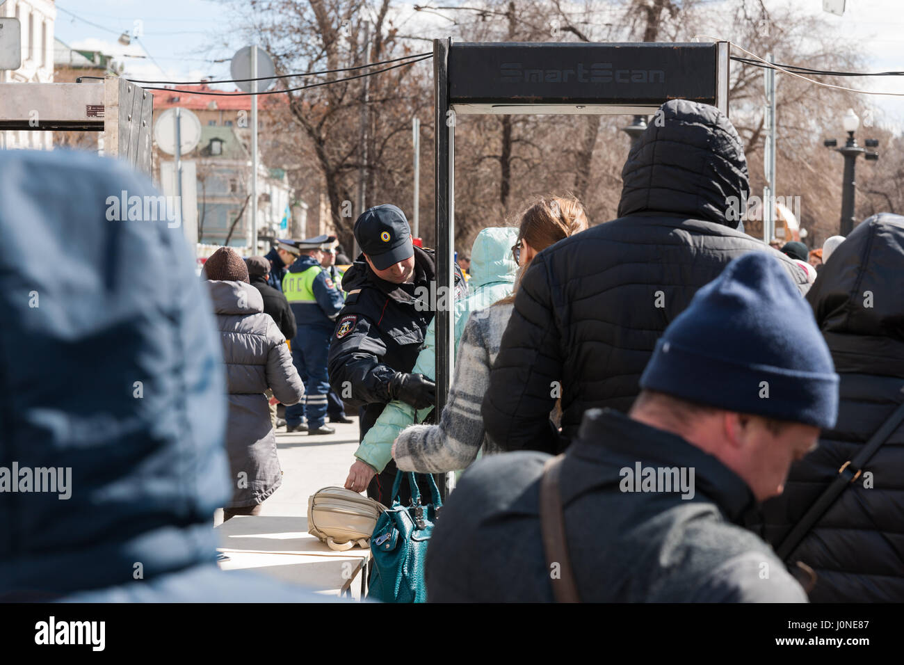 Moscow, Russia. Saturday, April 15, 2017. Tramway show and parade takes place in Moscow to celebrate 118 years of street car city service. People visit Chistoprudny (clean pond) boulevard to view and inspect in person old and new street cars and even and example of a vintage horse-drawn tram. Street car service was introduced in Moscow in 1899. Moscow street railway is 417 km (259 ml) long today. Every day about 650 street cars serve 47 routes. Careful security check and control at the entrance to the parade area. © Alex's Pictures/Alamy Live News Stock Photo