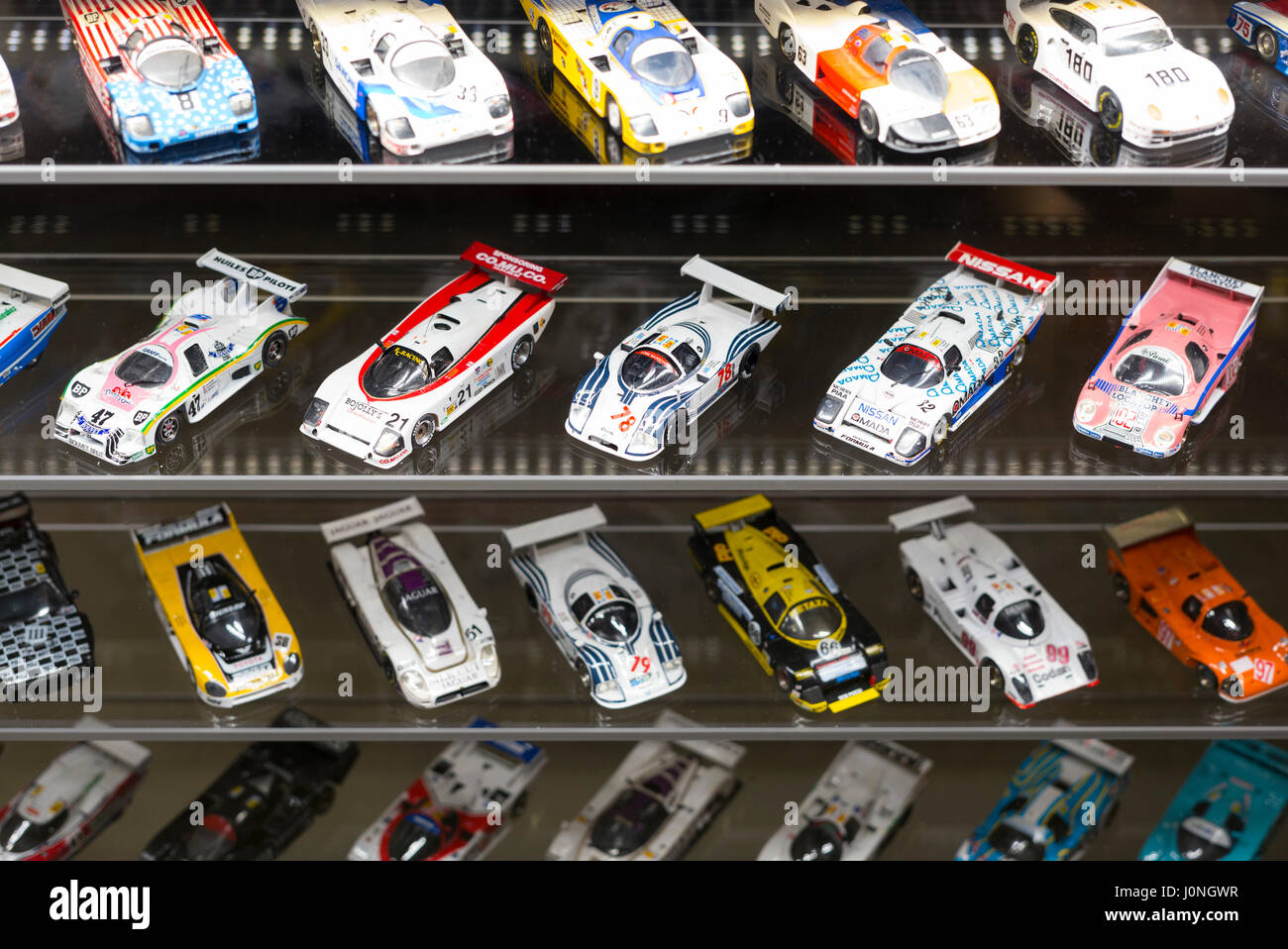 Miniature racing car models on display at the exhibition musee at Le Mans Racetrack in France Stock Photo