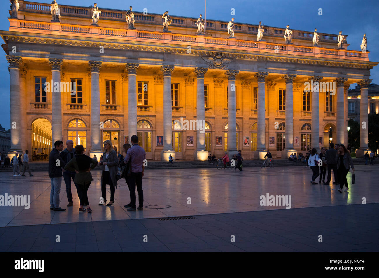 People in front of the Grand Theatre - Opera National de Bordeaux, Place de la Comedie, Bordeaux, France Stock Photo