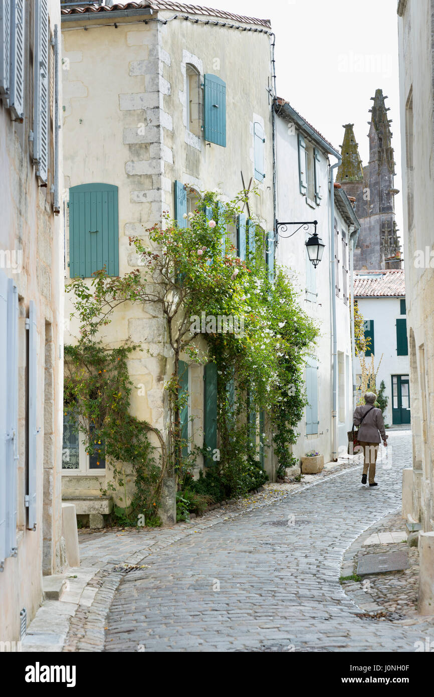 Typical street scene quaint house with shutters traditional