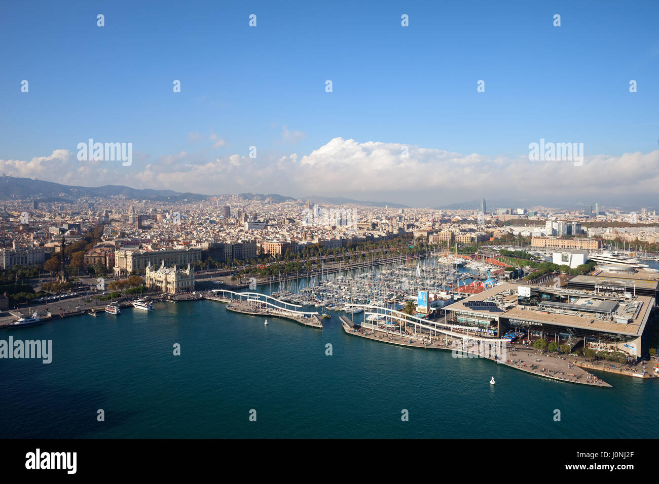 City of Barcelona aerial view in Catalonia, Spain, cityscape with Port Vell marina, Rambla de Mar, Maremagnum shopping centre. Stock Photo