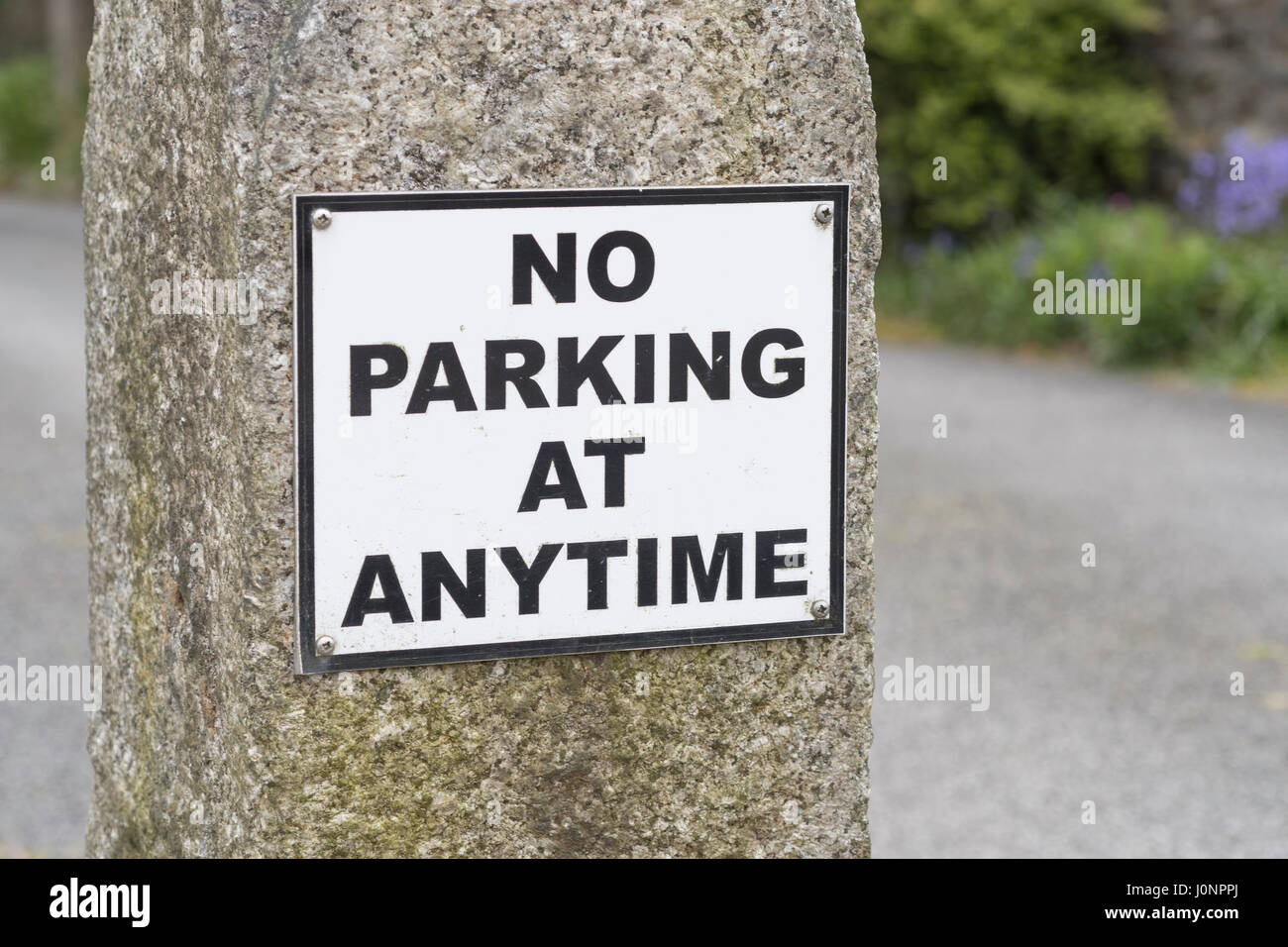 Small 'No Parking' sign - a visual metaphor for the concept of obeying the rules and control. Stock Photo