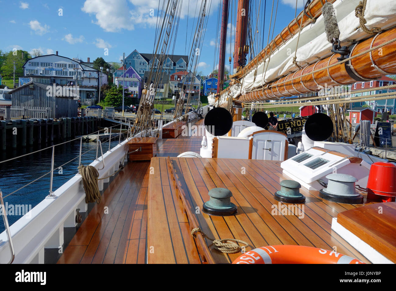 The deck of the Bluenose II tall ship and the waterfront at Stock Photo
