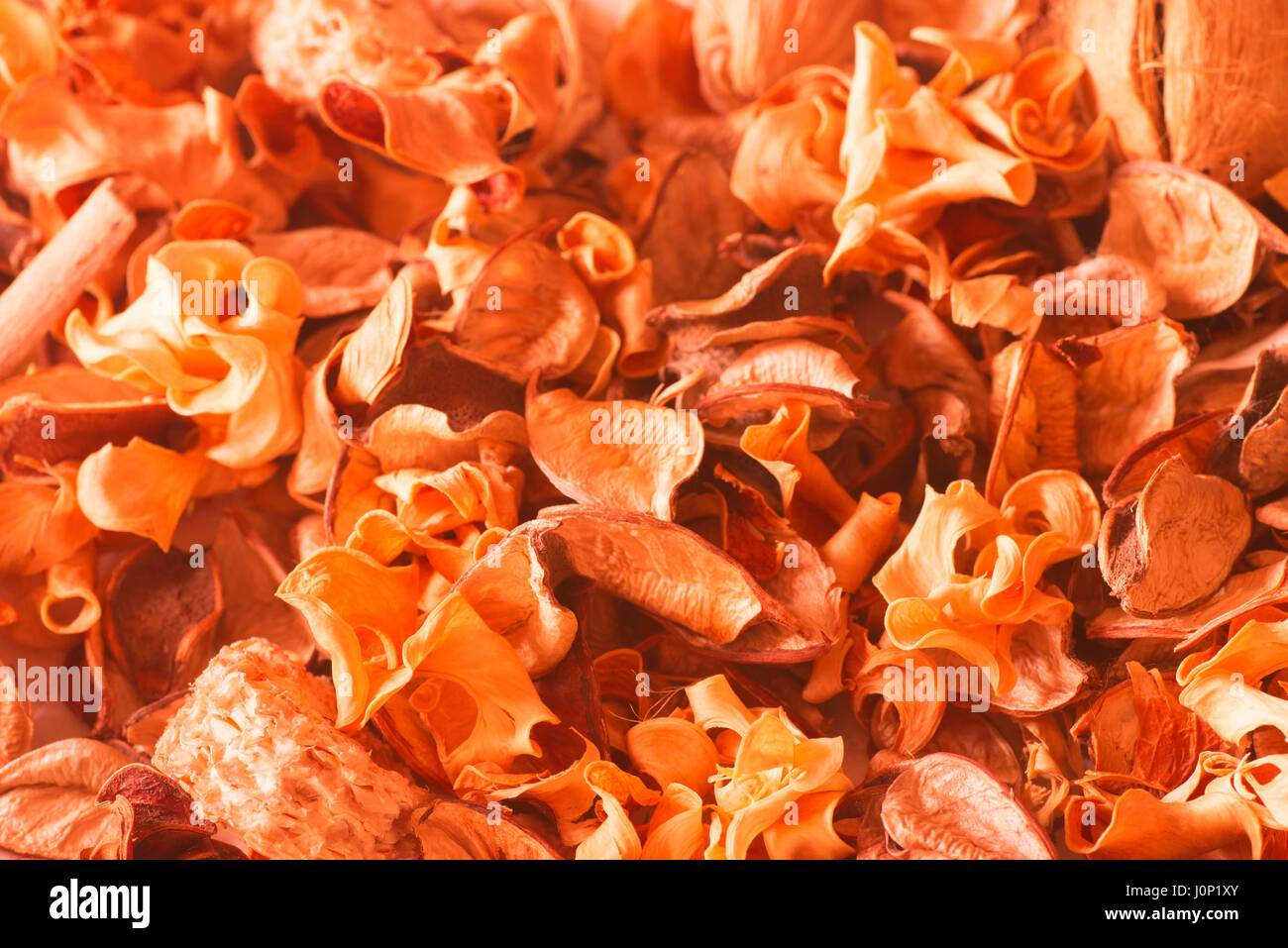 orange potpourri dried scented plants and flowers Stock Photo Alamy