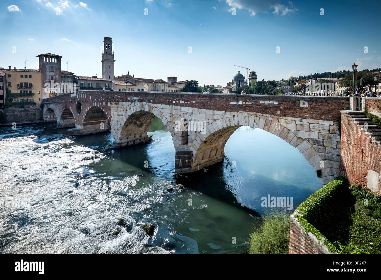 Verona, Italy - Ancient Roman bridge Ponte Pietra and the River Adige ...
