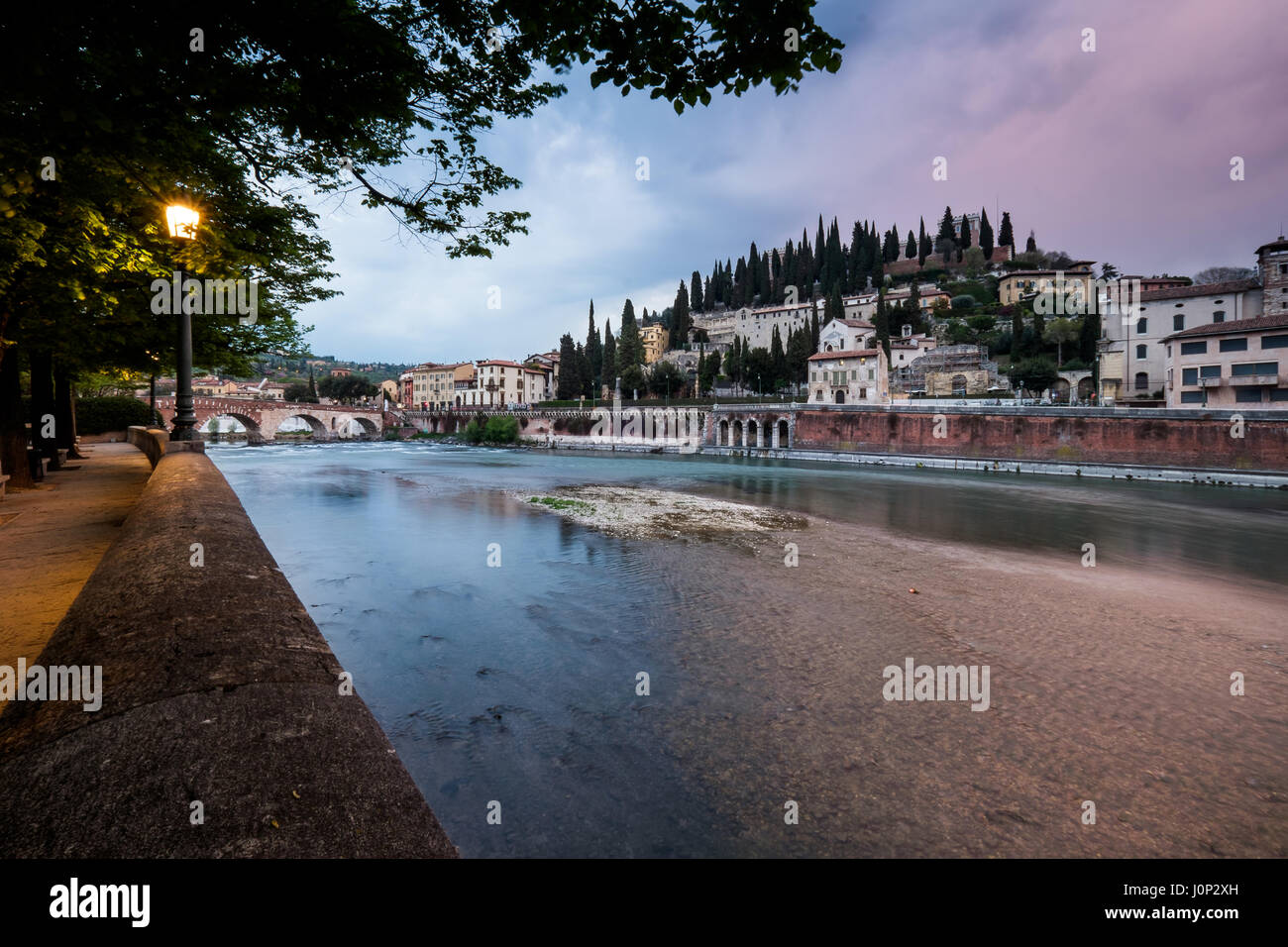 Verona, Italy - Ancient Roman bridge Ponte Pietra and the River Adige ...