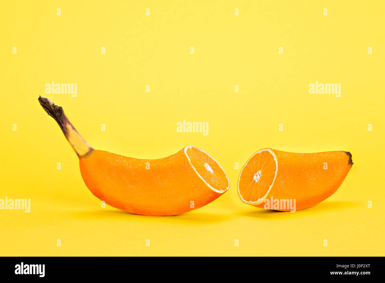 symbolic picture for crossbreeding of banana and orange Stock Photo Alamy
