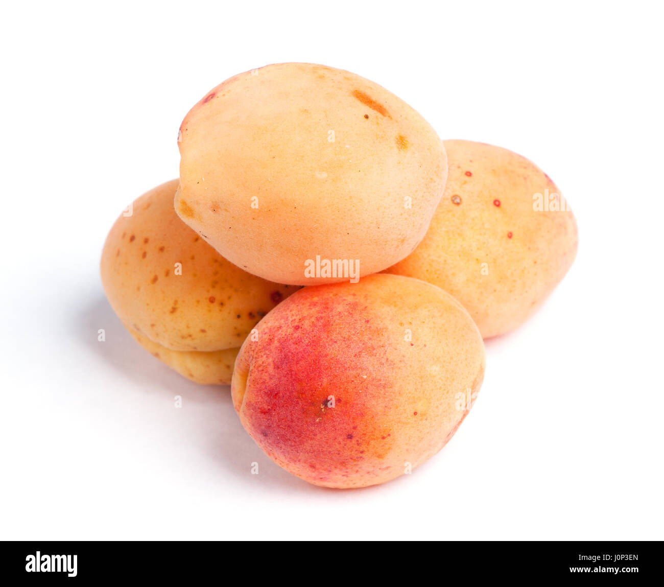 Real apricots isolated on white background Stock Photo - Alamy