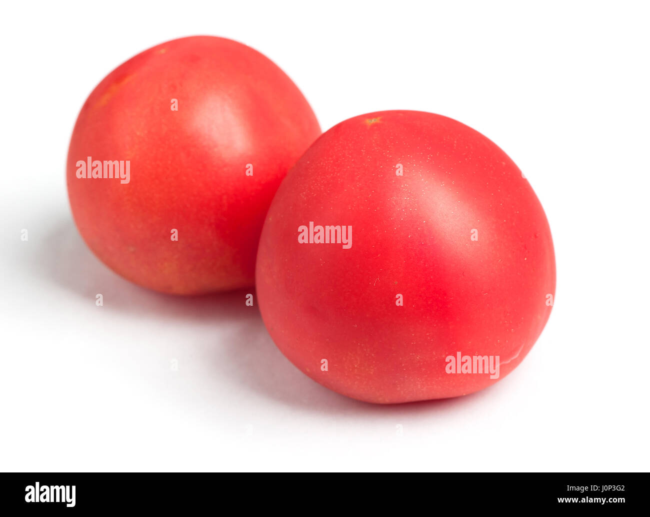 Tomatoes isolated on white background Stock Photo - Alamy