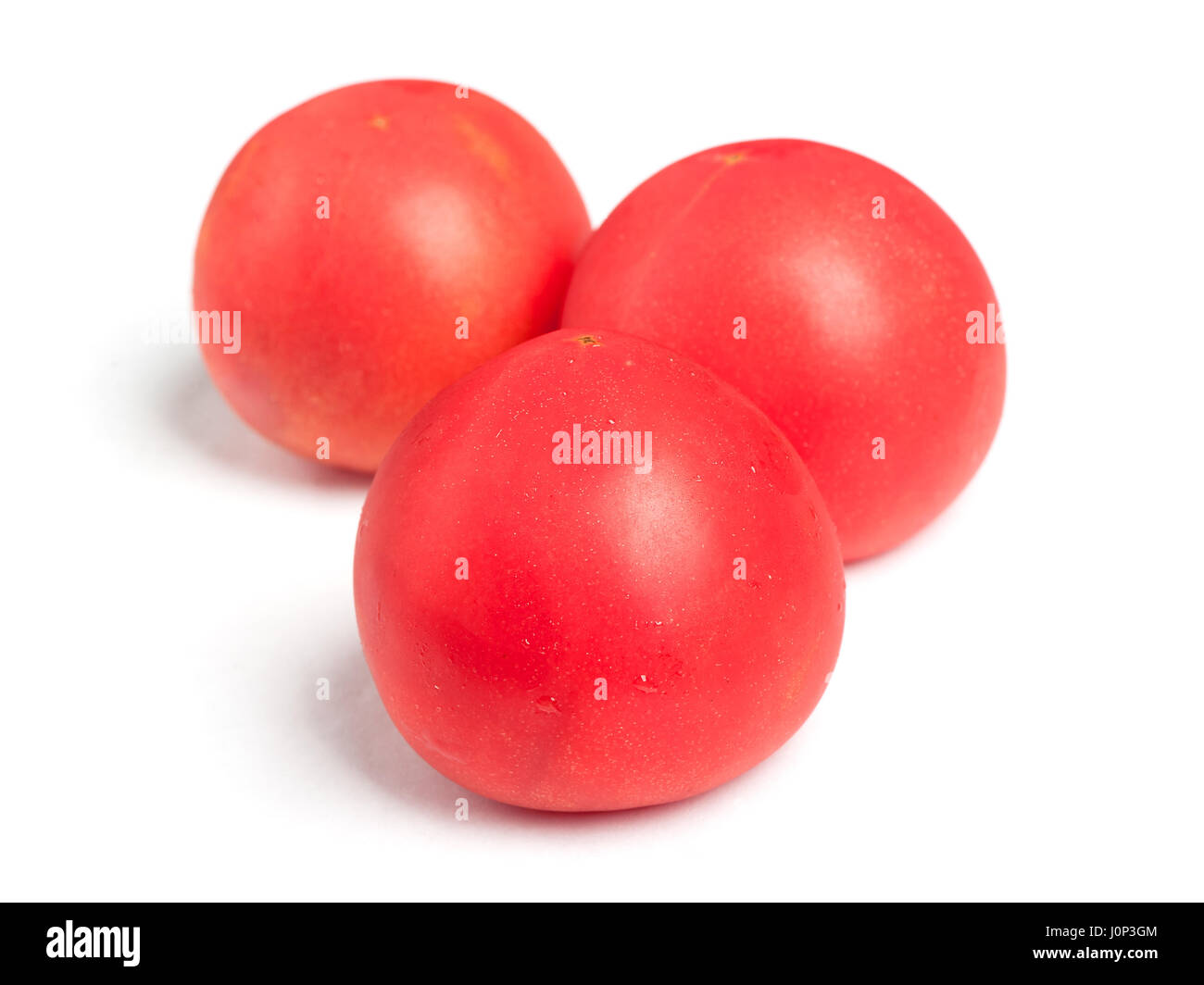 Tomatoes isolated on white background Stock Photo - Alamy